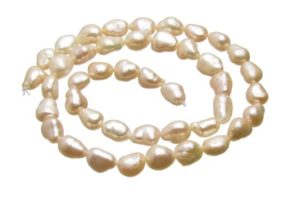 Soft Peach Elongated Nugget Freshwater Pearls approx. 7x10mm [strand]