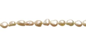 Soft Peach Elongated Nugget Freshwater Pearls approx. 7x10mm [strand]