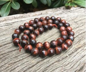 red tiger eye gemstone round beads 8mm faceted
