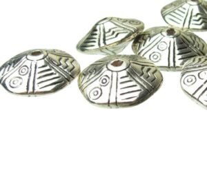 silver plastic aztec saucer spacer beads