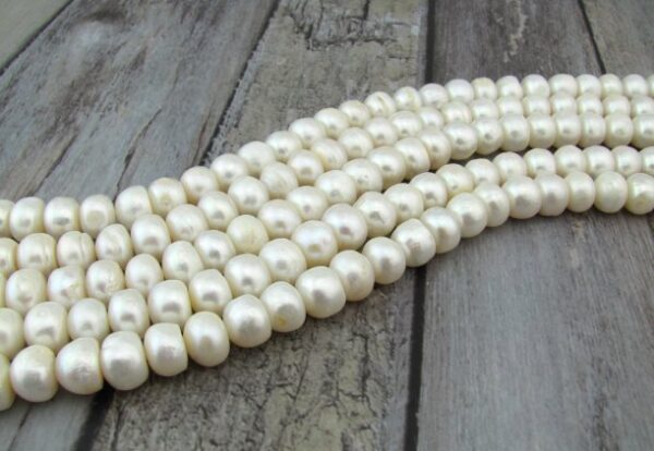 white rondelle button freshwater pearls