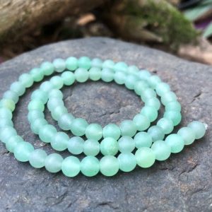 mattegreenaventurine6mmroundbeads4 green aventurine round gemstone beads with a matte finish
