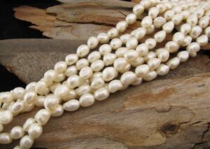 white elongated nugget freshwater pearls