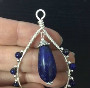 attach the lapis bead dangle to the earrings