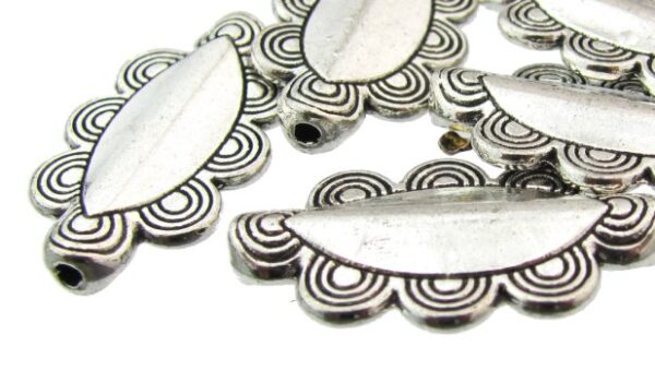 silver fancy oval feature beads