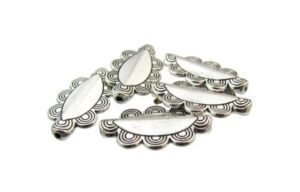 silver fancy oval feature beads