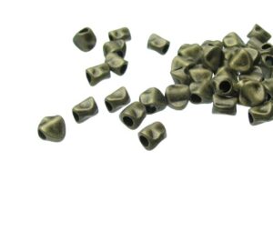 bronze pinched coin spacer beads