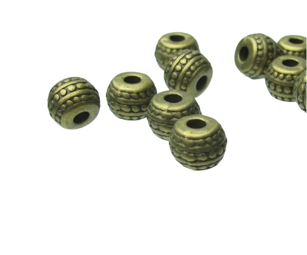 bronze spotty barrel metal spacer beads