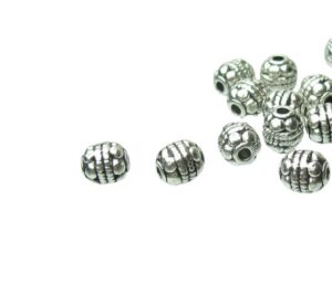 silver spotty oval metal spacer beads