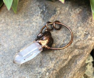 clear quartz pendant with copper