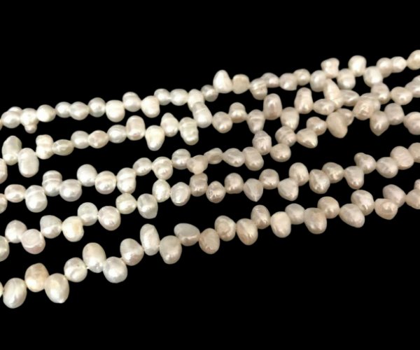 white top drilled nugget dancing freshwater pearls