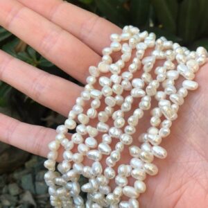 whitetopdrillednuggetpearls3 white top drilled nugget dancing freshwater pearls
