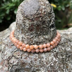 sunstone4mmfacetedroundbeads4